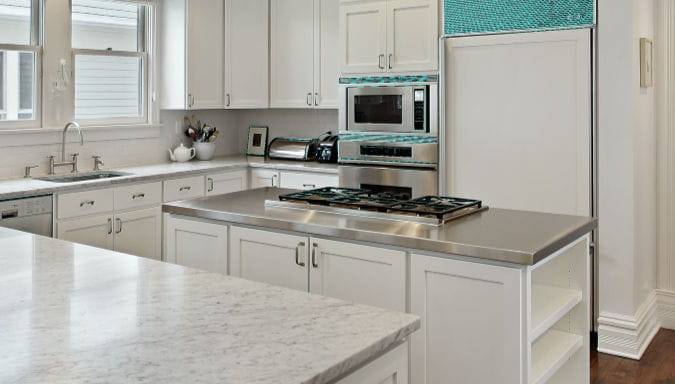 https://belloscleaning.com/wp-content/uploads/2019/03/stainless-steel-countertops-kitchen-island-white-kitchen.jpg