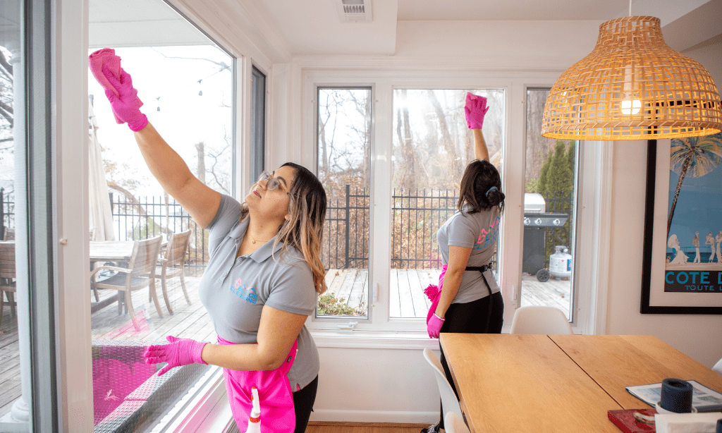 Bellos cleaning technicians are cleaning the windows- The Best Time of Year for a Deep Cleaning and Why It Matters- Bellos Cleaning - Annapolis, MD