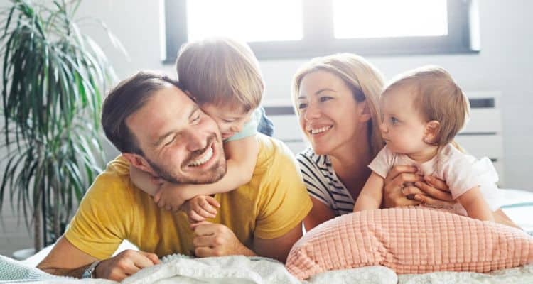Happy family enjoying a clean, fresh-smelling home in Annapolis after professional cleaning