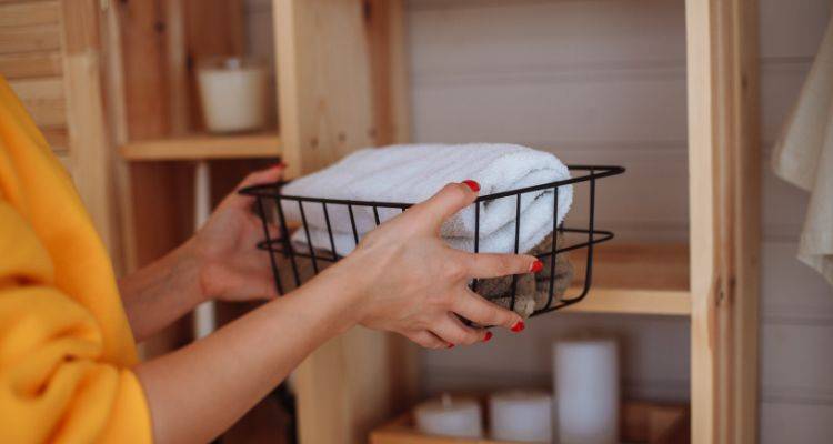 Tidying up before cleaners arrive in Annapolis home