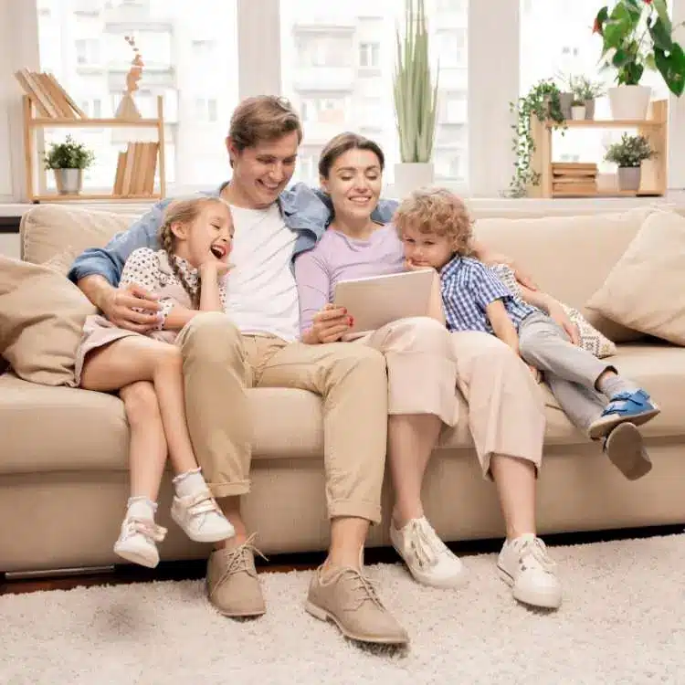 Maintenance General Cleaning Service in Crownsville MD-Happy family in living room